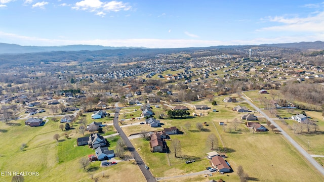 drone / aerial view featuring a mountain view