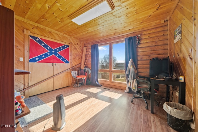 office space with log walls, wood finished floors, and wood ceiling