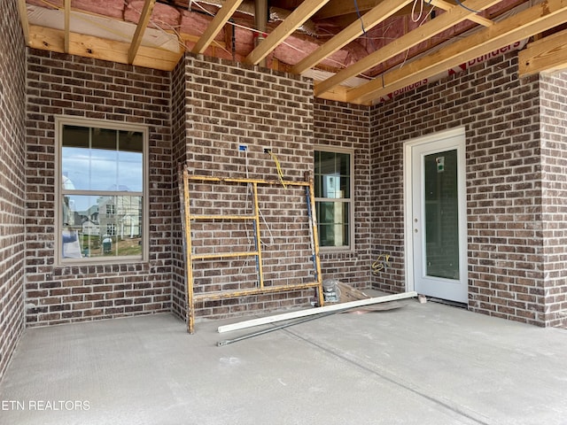 2127 Lantern Park Ln, Knoxville, TN 37932 - entrance to property featuring brick siding and a patio