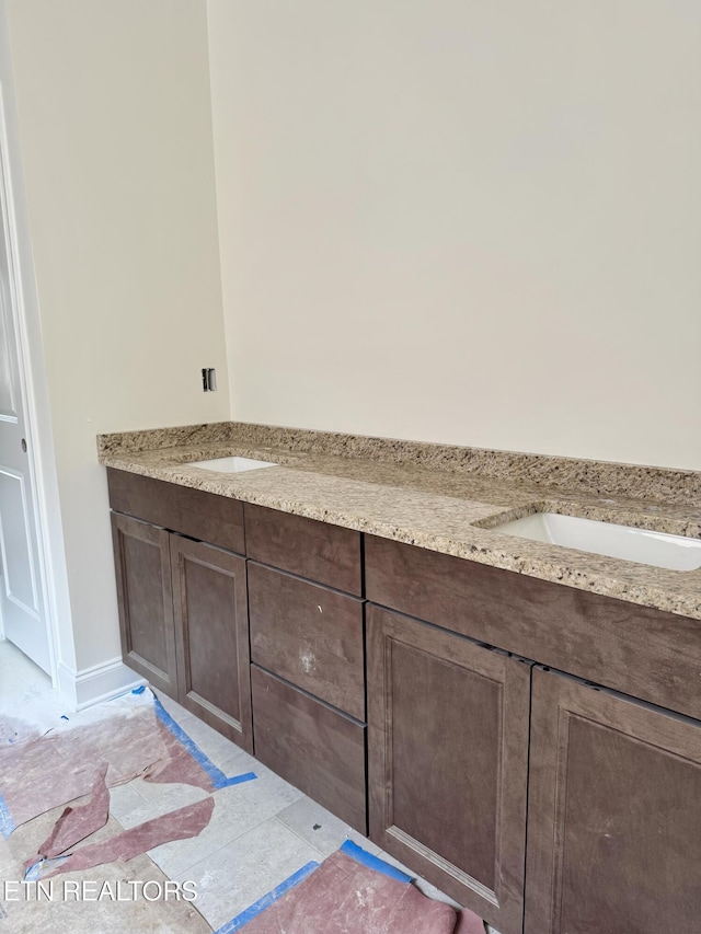 2127 Lantern Park Ln, Knoxville, TN 37932 - bathroom with double vanity and baseboards