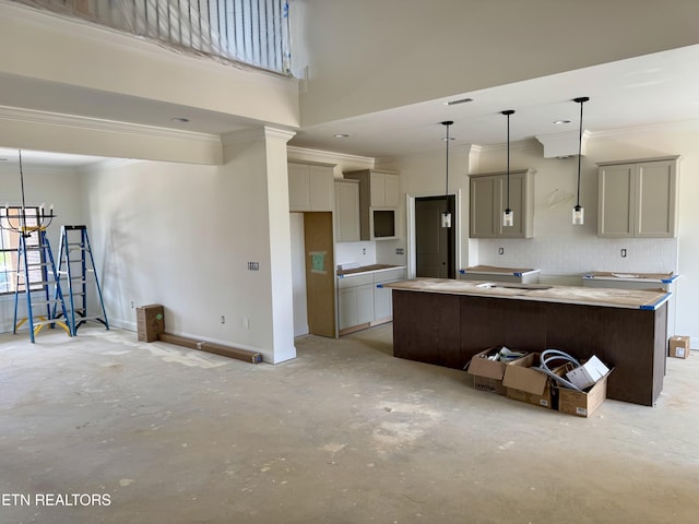 2127 Lantern Park Ln, Knoxville, TN 37932 - kitchen featuring gray cabinetry, a center island, crown molding, a high ceiling, and decorative backsplash