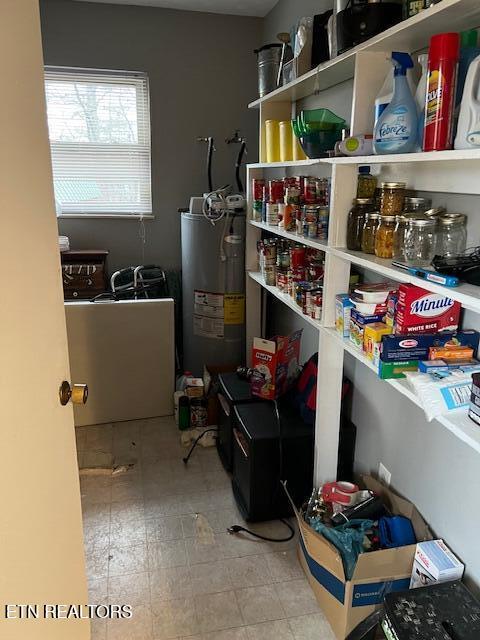 storage area featuring water heater