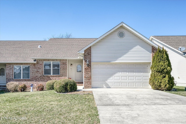 ranch-style home featuring a front lawn, driveway, a shingled roof, a garage, and brick siding