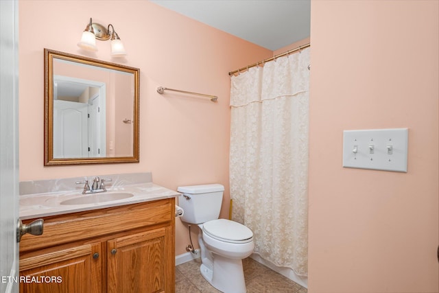 full bath featuring tile patterned flooring, toilet, and vanity