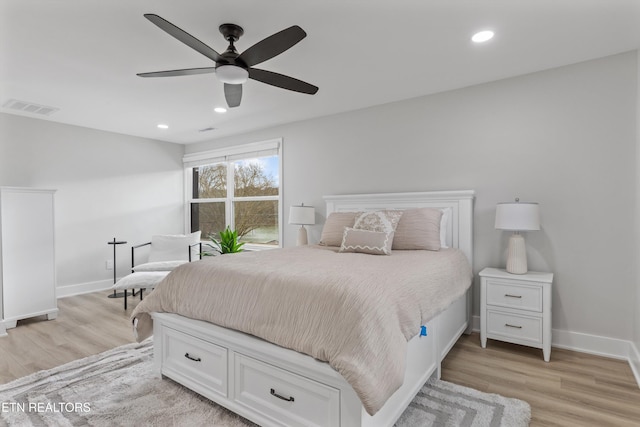 bedroom with recessed lighting, visible vents, baseboards, and light wood-style floors