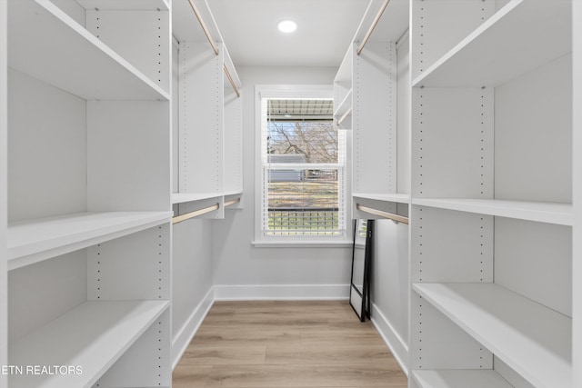 walk in closet featuring light wood-type flooring