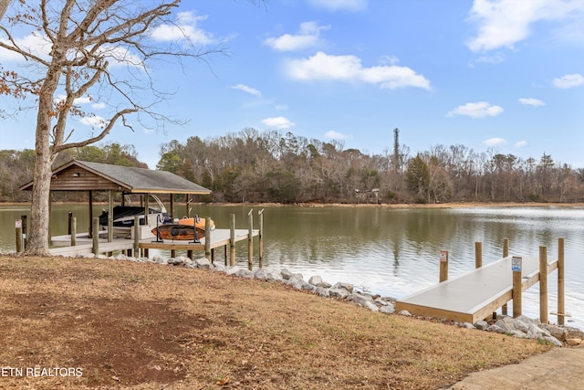 view of dock featuring a water view and boat lift