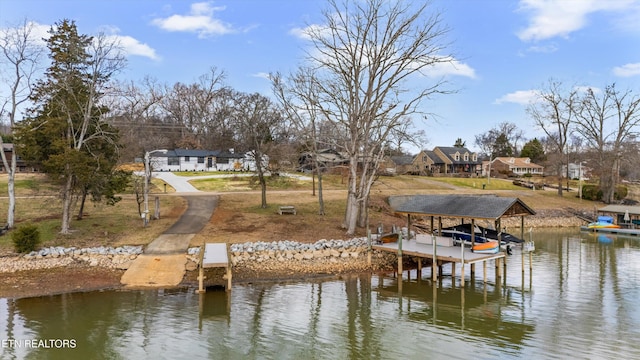 view of dock featuring a water view and boat lift