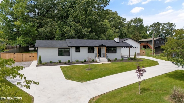 11433 Turkey Creek Rd, Knoxville, TN 37934 - view of front facade with concrete driveway, stucco siding, a gate, and a shingled roof