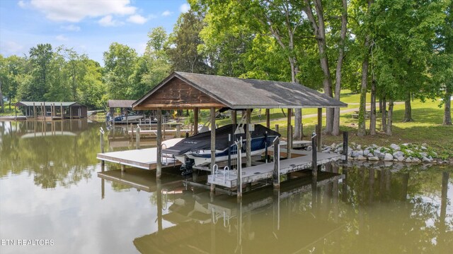 11433 Turkey Creek Rd, Knoxville, TN 37934 - dock featuring boat lift, a water view, and view of wooded area