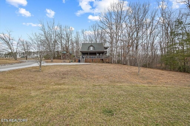 view of yard with a porch