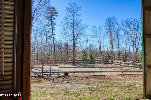 view of yard with an enclosed area and fence