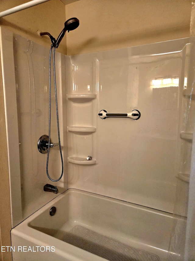 bathroom featuring shower / washtub combination