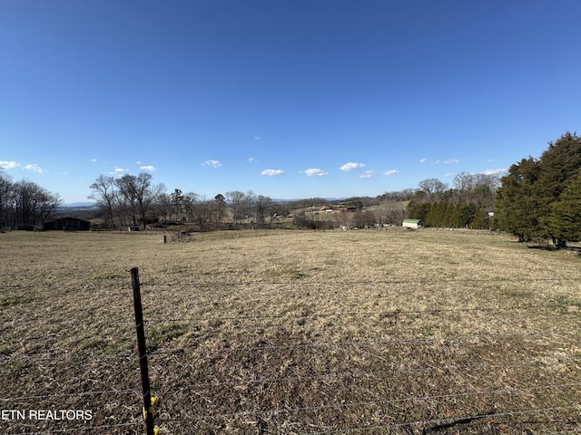 view of yard featuring a rural view