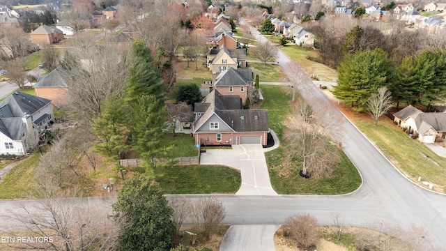 birds eye view of property with a residential view