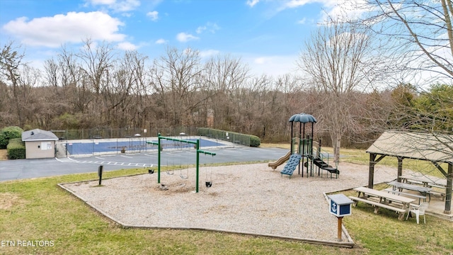 community jungle gym with fence