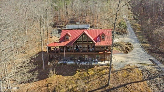 exterior space with a forest view