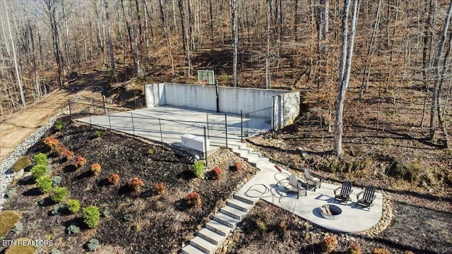 exterior space with fence and basketball court