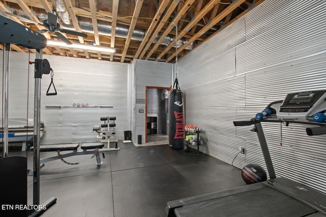 exercise area featuring metal wall