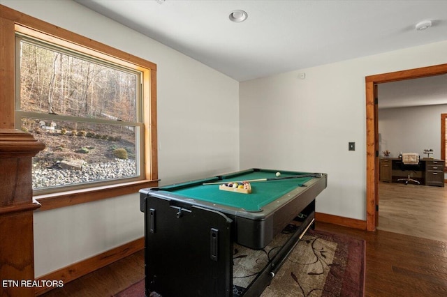 playroom with plenty of natural light, baseboards, and wood finished floors