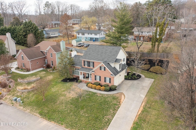 drone / aerial view with a residential view