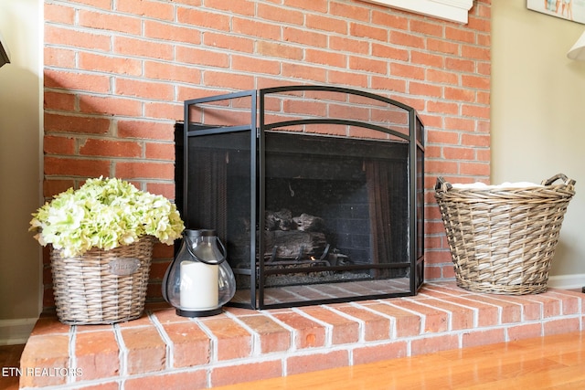 room details with a fireplace and baseboards