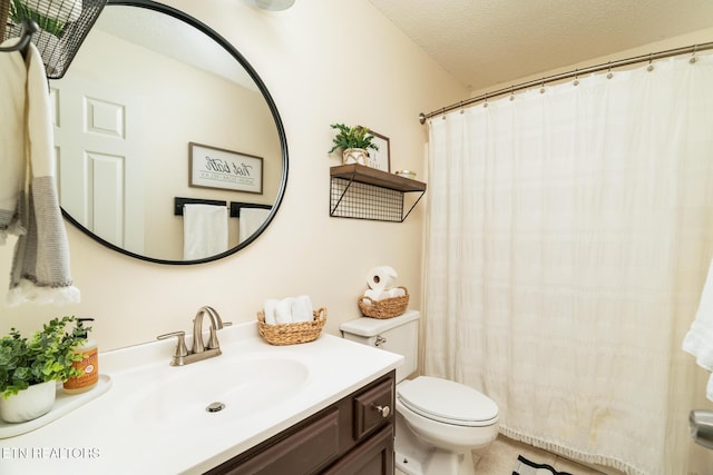 bathroom with toilet, a textured ceiling, vanity, and a shower with curtain