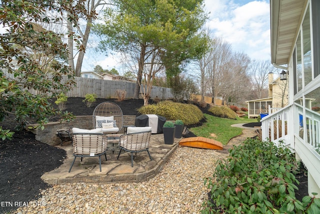 view of yard with a patio, a sunroom, and fence