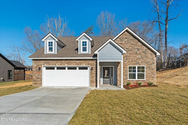 view of front of property featuring concrete driveway, stone siding, roof with shingles, an attached garage, and a front yard