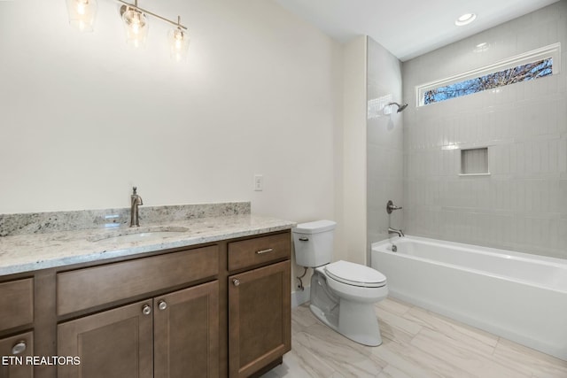 full bathroom featuring shower / tub combination, vanity, and toilet