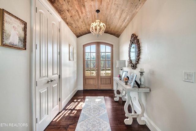 foyer with baseboards, dark wood finished floors, wood ceiling, vaulted ceiling, and french doors