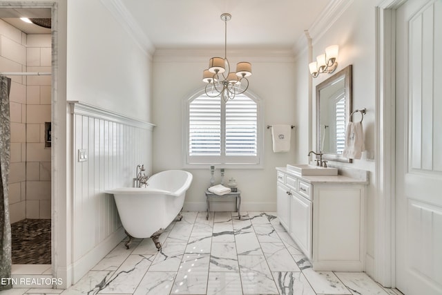 bathroom with a healthy amount of sunlight, marble finish floor, ornamental molding, and a tile shower