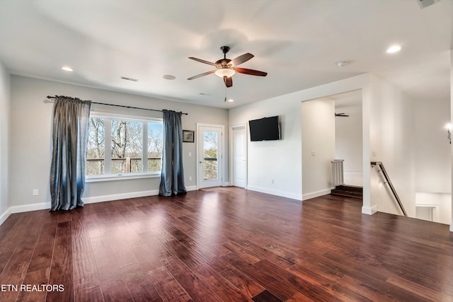 spare room with baseboards, visible vents, a ceiling fan, dark wood-style flooring, and recessed lighting