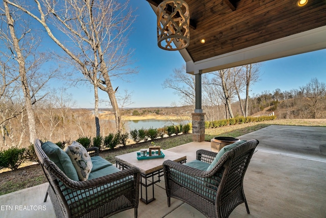 view of patio featuring a water view