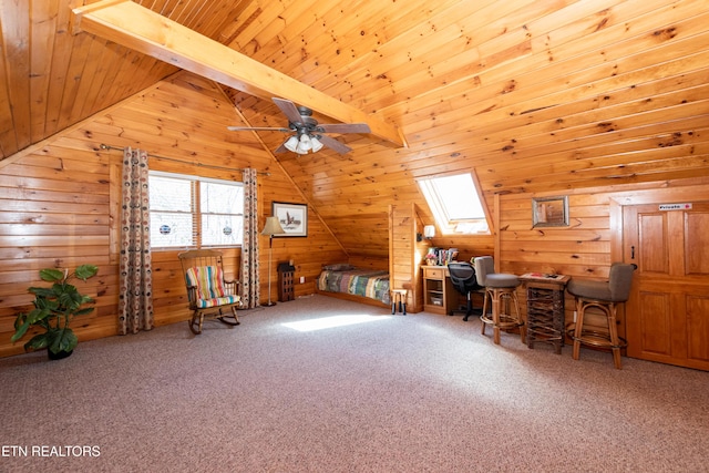 bedroom featuring carpet floors, wood ceiling, wooden walls, and lofted ceiling with skylight