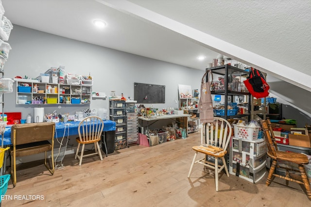 office space with hardwood / wood-style flooring