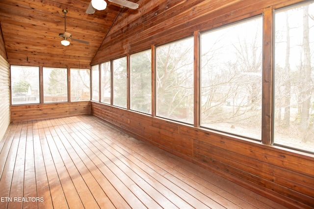 unfurnished sunroom with vaulted ceiling, a sauna, wooden ceiling, and ceiling fan