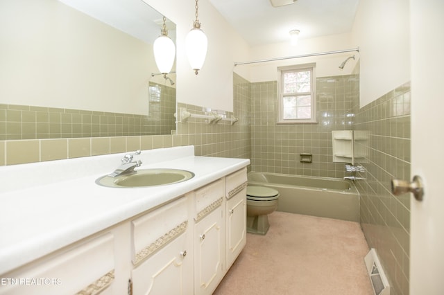 full bath with vanity, visible vents, tub / shower combination, tile walls, and toilet