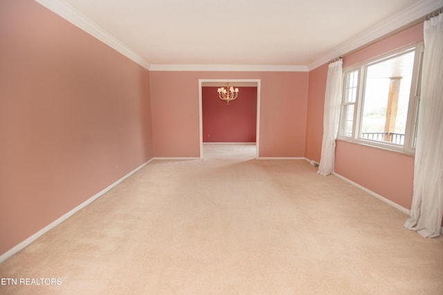 unfurnished room featuring a notable chandelier, light colored carpet, baseboards, and ornamental molding