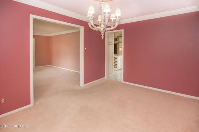 unfurnished room with a chandelier, light colored carpet, baseboards, and ornamental molding