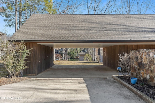 view of car parking featuring concrete driveway