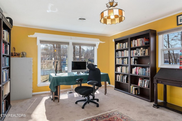 office with light carpet, visible vents, ornamental molding, and baseboards