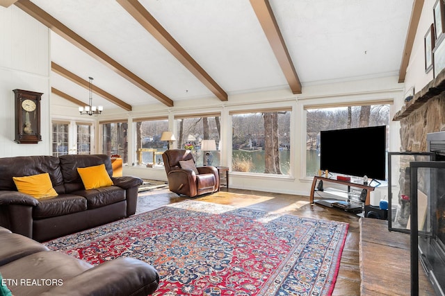 living area featuring vaulted ceiling with beams, a chandelier, and dark wood finished floors