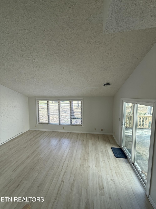 7000 Big Horn Dr Unit A-3, Crossville, TN 38572 - interior space featuring visible vents, plenty of natural light, and wood finished floors