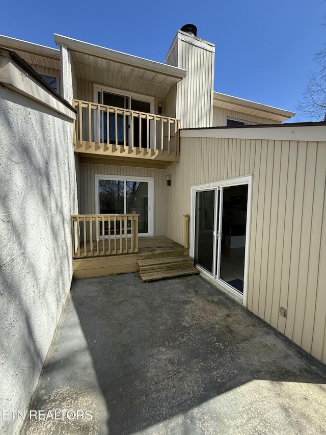 7000 Big Horn Dr Unit A-3, Crossville, TN 38572 - rear view of property with a chimney, a patio area, and a balcony