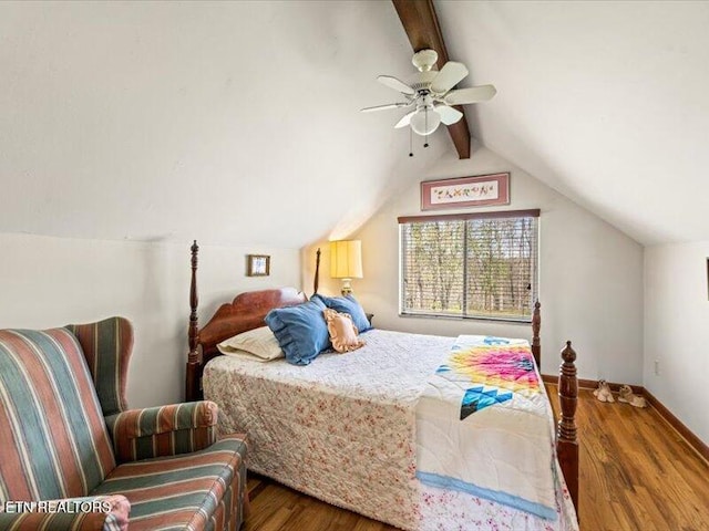 bedroom featuring vaulted ceiling with beams, a ceiling fan, baseboards, and wood finished floors