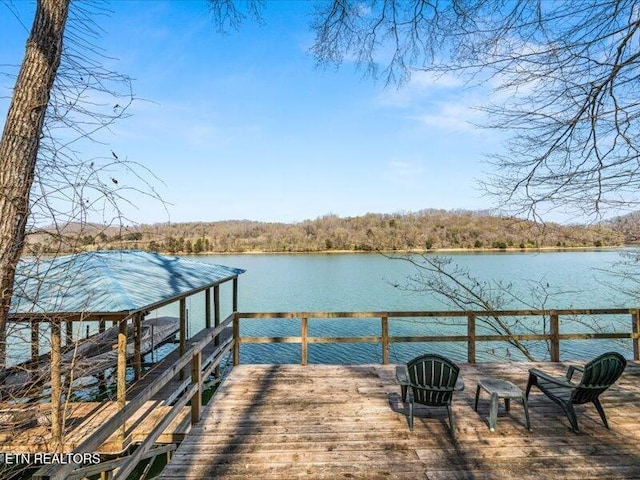 view of dock with a water view