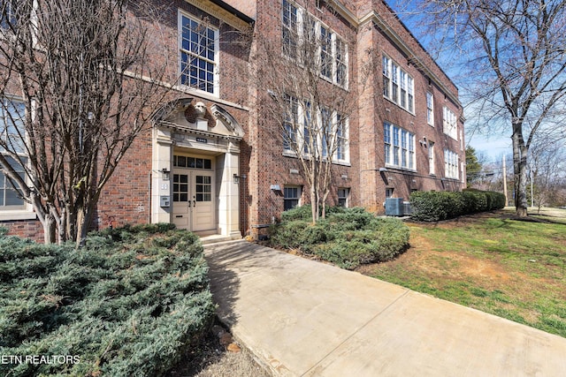 view of building exterior featuring central AC unit