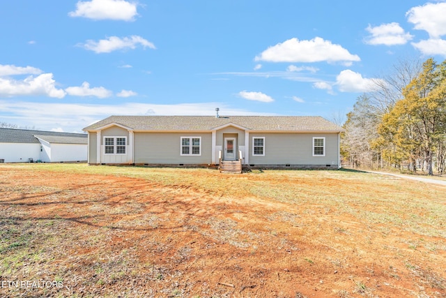 ranch-style house with a front yard and crawl space