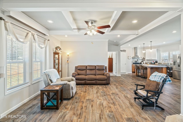 living room featuring plenty of natural light, baseboards, coffered ceiling, and dark wood-type flooring